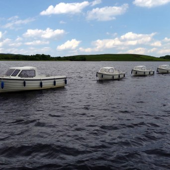 a small boat in a body of water